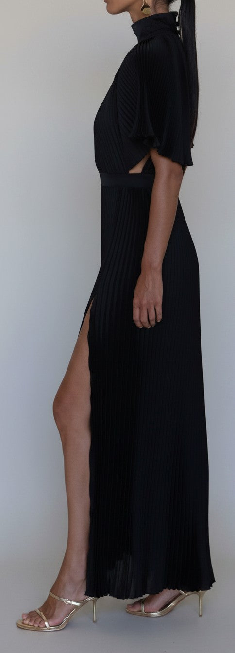 S T Y L E L I B R A R Y black pleated Anais gown with flared sleeves, sculpted waist, and thigh-high side split